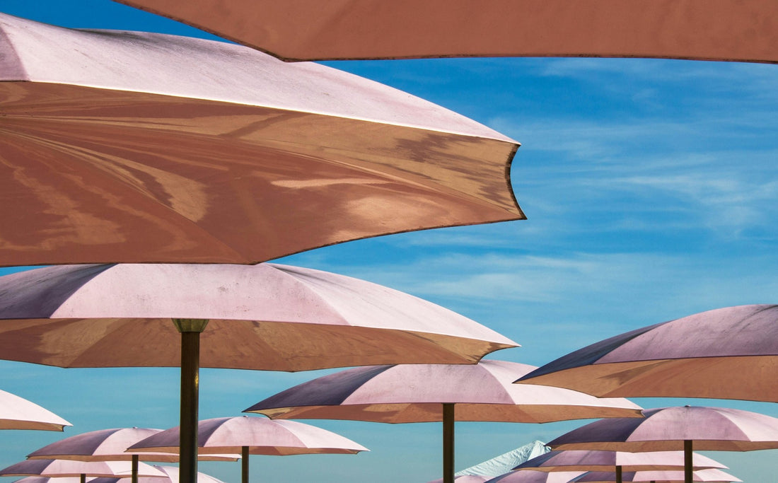 Pink Beach Umbrelas With a Light Blue Sky